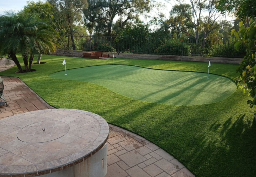 Backyard turf putting green & pavers newly installed in San Diego, CA