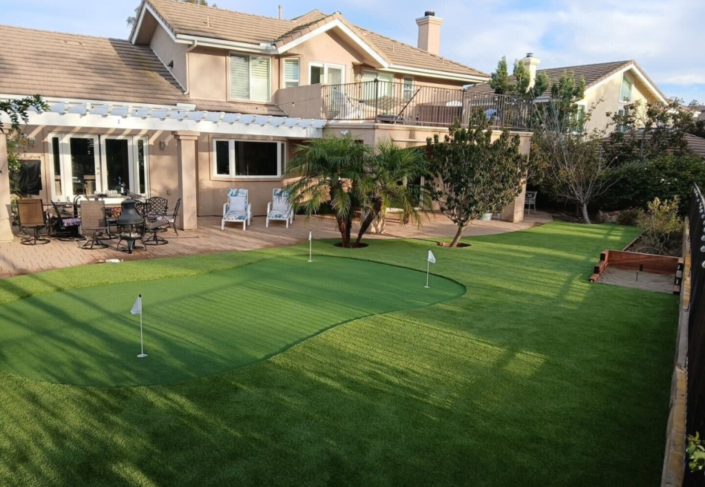 Backyard turf putting green & pavers newly installed in San Diego, CA