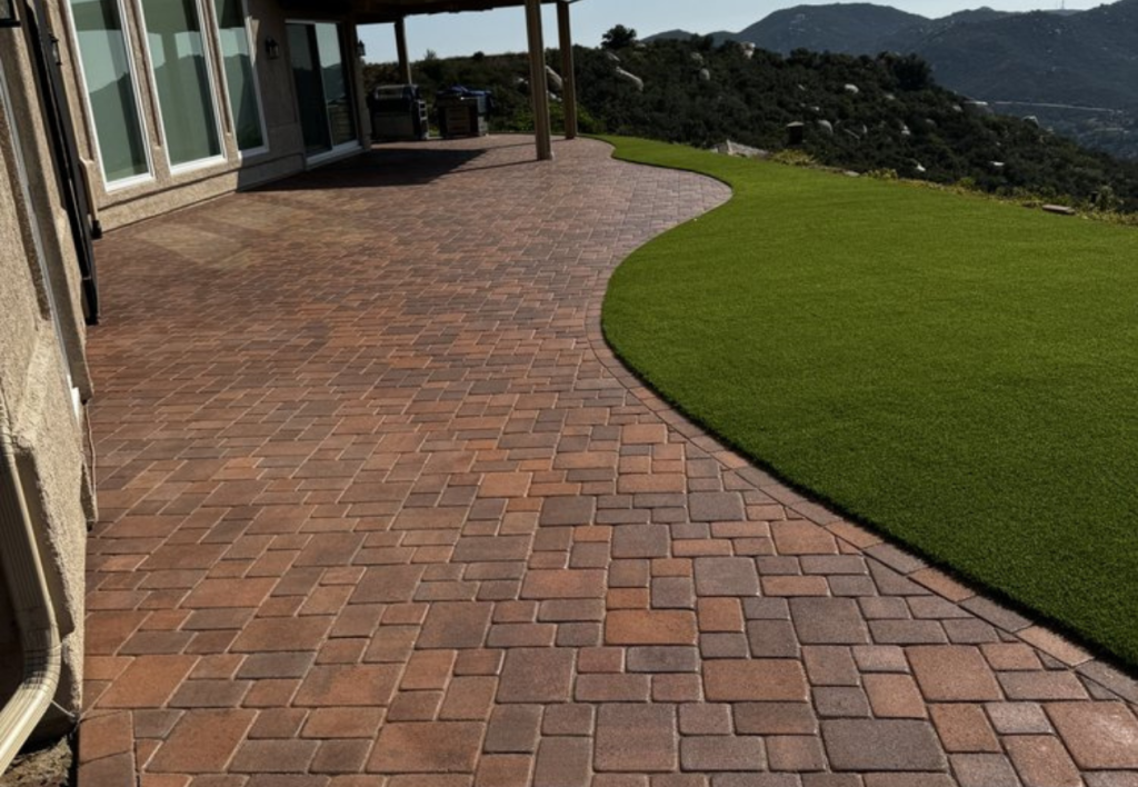 Turf & pavers newly installed in San Diego backyard