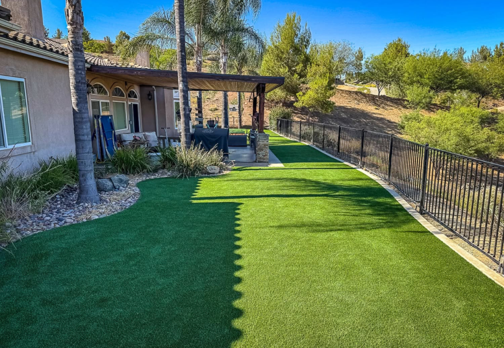 Backyard turf & pavers newly installed in San Diego, CA