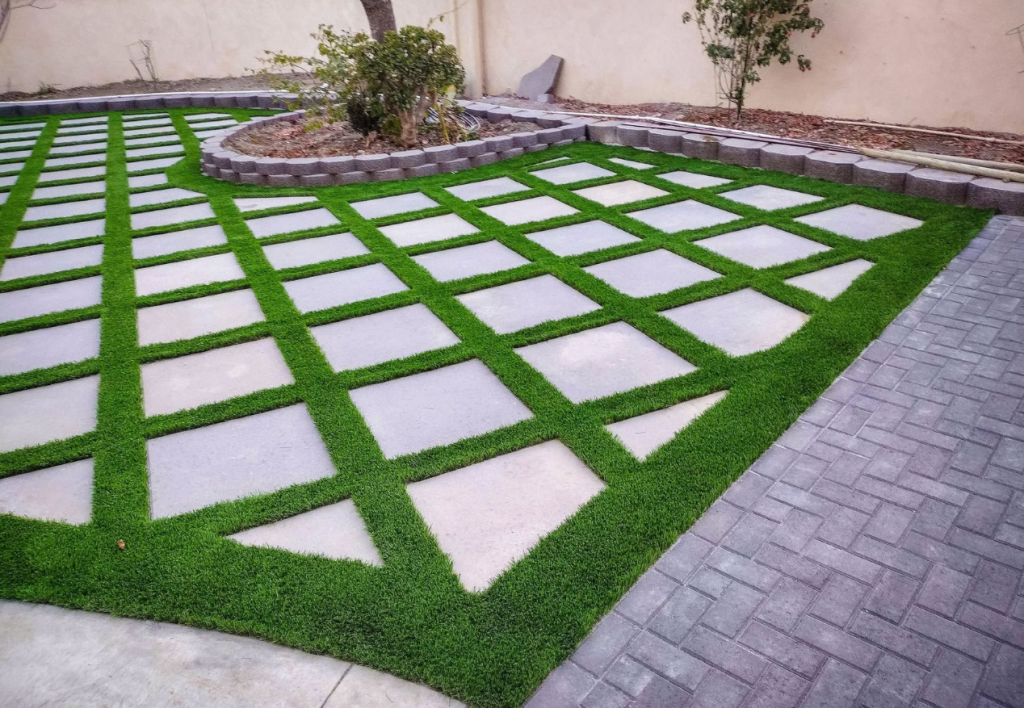 Backyard turf & pavers newly installed in San Diego, CA