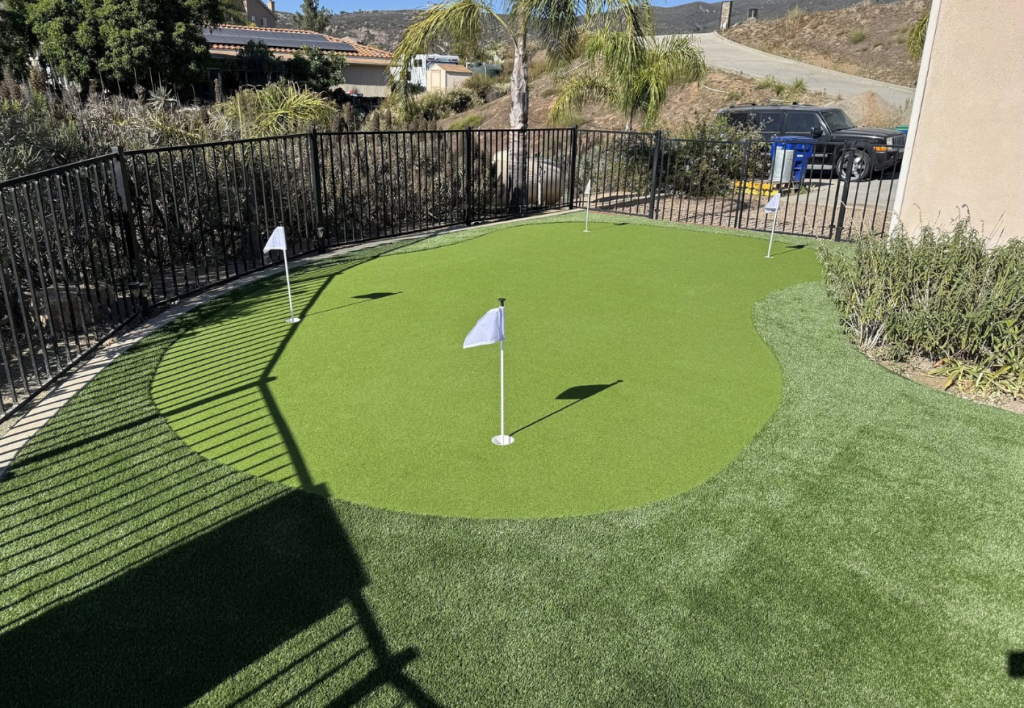 Backyard turf putting green & pavers newly installed in San Diego, CA
