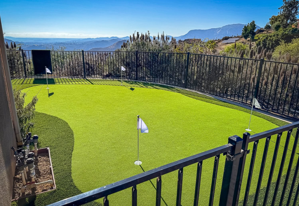 Backyard turf putting green & pavers newly installed in San Diego, CA
