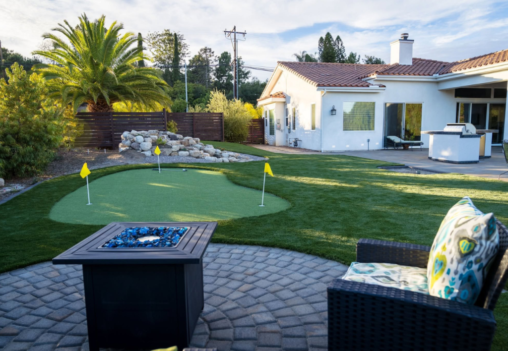 Backyard turf putting green & pavers newly installed in San Diego, CA