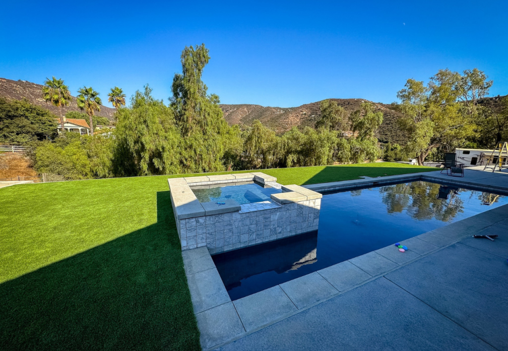 Backyard turf & pavers newly installed in San Diego, CA