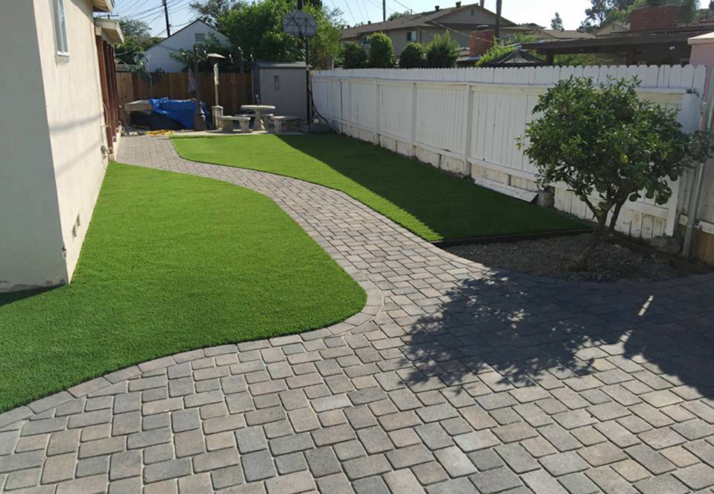 Freshly installed backyard turf & pavers in San Diego, CA