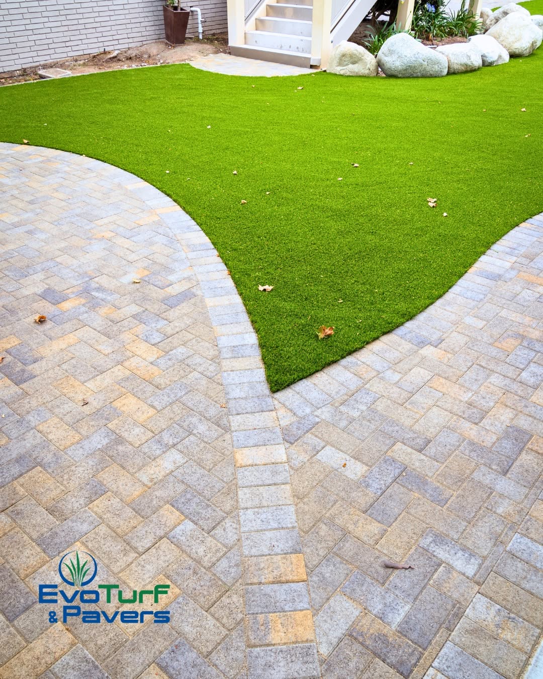 Freshly installed backyard turf & pavers in San Diego, CA