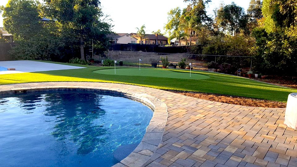 Freshly installed backyard turf & pavers in San Diego, CA