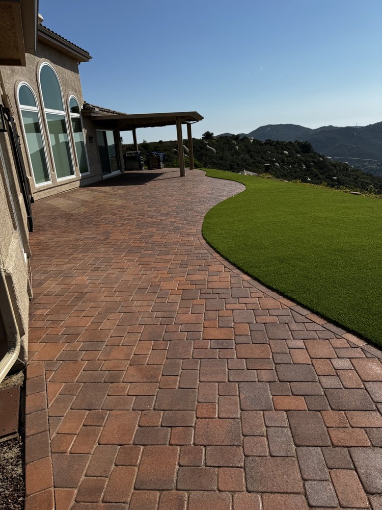 Freshly installed backyard turf & pavers in San Diego, CA