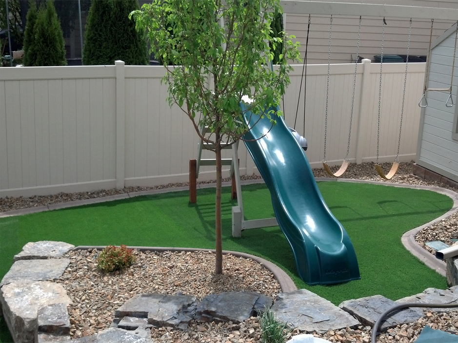 Freshly installed backyard turf & pavers in San Diego, CA